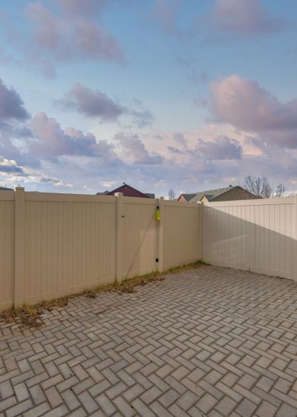 Tan PVC Fence Installation in Santa Fe
